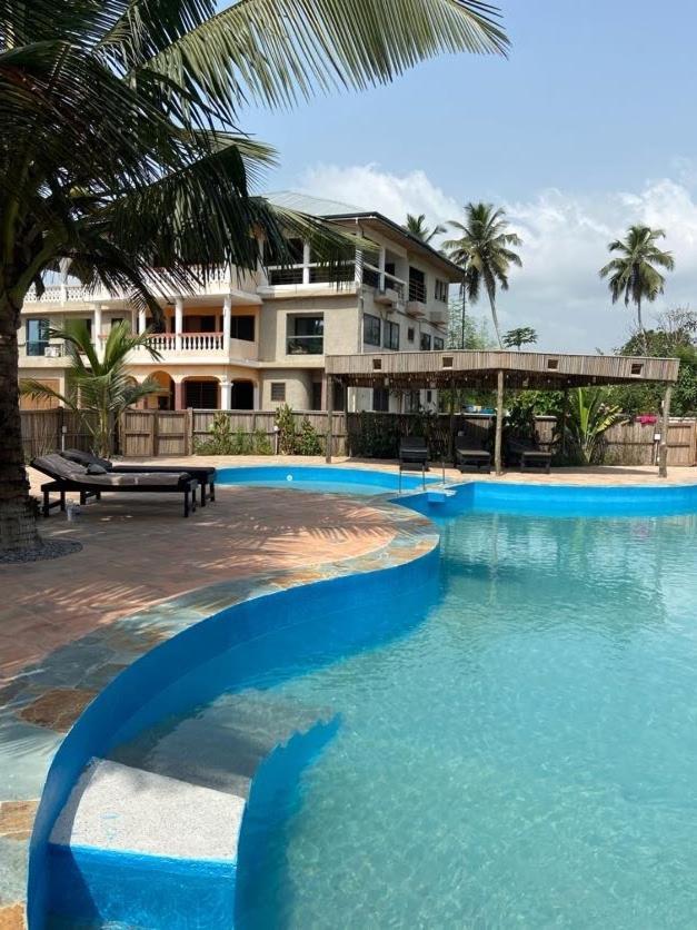 Afiki Hotel Elmina Bagian luar foto