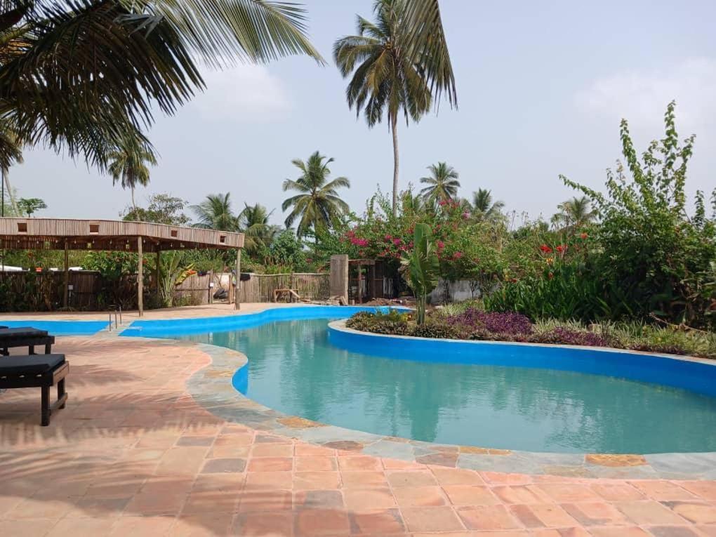Afiki Hotel Elmina Bagian luar foto